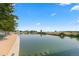 Scenic community pond offering a tranquil environment for relaxation at 2853 Yosemite St, Denver, CO 80238