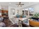 Open-concept living room featuring hardwood floors, natural light, and modern furnishings at 2853 Yosemite St, Denver, CO 80238