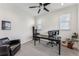 Office space with natural light and comfortable seating, perfect for a home office setup at 2853 Yosemite St, Denver, CO 80238