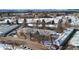 Birds eye view of apartments with snow covered grounds and roads at 705 S Clinton # 2A, Denver, CO 80247