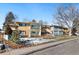 Beautiful two-story condo with balconies and covered patios on a sunny day at 705 S Clinton # 2A, Denver, CO 80247