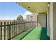 Balcony featuring turf covering, metal railings and exterior views at 14300 E Marina Dr # 512, Aurora, CO 80014
