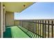 Balcony featuring turf covering, metal railings and exterior views at 14300 E Marina Dr # 512, Aurora, CO 80014
