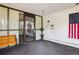 Inviting entrance lobby with American flag, bench seating, and secure entry system at 14300 E Marina Dr # 512, Aurora, CO 80014