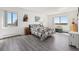 Spacious main bedroom featuring vinyl flooring, windows with beautiful views, and lots of sunlight at 14300 E Marina Dr # 512, Aurora, CO 80014