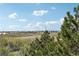 Scenic view from property overlooking a landscape with lush greenery and a clear, blue sky at 14300 E Marina Dr # 512, Aurora, CO 80014