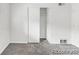 Bedroom featuring neutral walls, carpet, and a closet at 1723 Robb St # 44, Lakewood, CO 80215