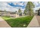 Community green space offers a pleasant setting for residents near the apartment buildings at 1723 Robb St # 44, Lakewood, CO 80215