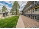 Community green space provides a welcoming atmosphere and is located near the apartment buildings at 1723 Robb St # 44, Lakewood, CO 80215