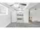 Efficient kitchen with white appliances open to living area at 1723 Robb St # 44, Lakewood, CO 80215