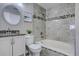 Updated bathroom with tub, shower, and stylish vanity at 5690 W 80Th Pl # 91, Arvada, CO 80003