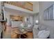 Open living room and kitchen with hardwood floors at 5690 W 80Th Pl # 91, Arvada, CO 80003