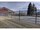 Community pool with black metal fence at 5690 W 80Th Pl # 91, Arvada, CO 80003