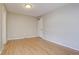 Empty spare bedroom with light walls and hardwood floor at 5690 W 80Th Pl # 91, Arvada, CO 80003