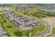 An aerial perspective shows the home's location within a planned community, highlighting its positioning and neighborhood at 228 Rogers Ct, Castle Rock, CO 80104