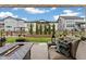 Spacious backyard with a modern fire pit and comfortable seating, ideal for outdoor gatherings at 228 Rogers Ct, Castle Rock, CO 80104