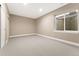 Spacious basement bedroom with neutral carpet and a window for natural light at 228 Rogers Ct, Castle Rock, CO 80104