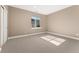 Unfinished bedroom with neutral carpet and a window for natural light at 228 Rogers Ct, Castle Rock, CO 80104