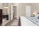 Comfortable bedroom features a large window and access to an en-suite bathroom at 228 Rogers Ct, Castle Rock, CO 80104