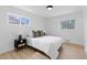 Bright bedroom with natural light, a comfortable bed, and contemporary decor at 3055 S Winona Ct, Denver, CO 80236
