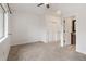 Neutral bedroom boasts new carpet, closet, and ensuite access at 6071 S Detroit St, Centennial, CO 80121