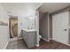 Bathroom featuring modern vanity with a shower stall, providing a functional space at 5932 S Versailles St, Aurora, CO 80015