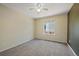 A serene bedroom, ready to be furnished, offering a peaceful ambiance with ample natural light at 5932 S Versailles St, Aurora, CO 80015