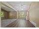 Bright dining room features neutral walls, wood floors, and natural light at 5932 S Versailles St, Aurora, CO 80015