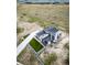 Stunning aerial view of modern home showcasing its architecture, landscaping, and surrounding land at 8765 Canyon Wind St, Parker, CO 80138