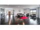 Finished basement features sleek seating area with modern decor at 8765 Canyon Wind St, Parker, CO 80138