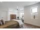 Cozy bedroom with plush carpet, neutral tones, and ample natural light at 8765 Canyon Wind St, Parker, CO 80138