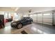 Spacious garage with epoxy flooring, ample storage and newer car at 8765 Canyon Wind St, Parker, CO 80138