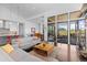 Spacious living room with large windows, open floor plan, and stylish modern decor at 8765 Canyon Wind St, Parker, CO 80138