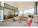 Outdoor patio area with a lounge area, fire pit, and views of the neighborhood at 8765 Canyon Wind St, Parker, CO 80138