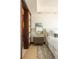 Bright bedroom with a sliding door closet, nightstand, mirror and carpet at 1133 14Th St # 2000, Denver, CO 80202
