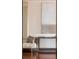 Stylish hallway area featuring modern art and seating at 1133 14Th St # 2000, Denver, CO 80202