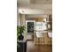 Modern kitchen featuring stainless steel appliances, a sleek island, and modern countertops at 1133 14Th St # 2000, Denver, CO 80202