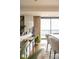 Bright living space featuring a modern sofa, stylish decor, and large windows with city views at 1133 14Th St # 2000, Denver, CO 80202