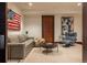 Cozy living room featuring comfortable seating, modern decor, and recessed lighting at 1133 14Th St # 2000, Denver, CO 80202