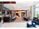 Spacious lounge area featuring modern bar, comfortable seating, and contemporary lighting at 1133 14Th St # 2000, Denver, CO 80202