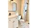 Stylish bathroom with a tiled shower, a modern vanity, and updated fixtures at 7460 W Bails Ave, Lakewood, CO 80232