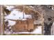 Aerial view of a house and its surrounding lot at 9962 W 77Th Ave, Arvada, CO 80005