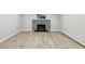 Basement fireplace with geometric tile surround at 9962 W 77Th Ave, Arvada, CO 80005