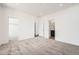 Spacious bedroom with plush carpet, two closets, and neutral paint at 2150 S Haleyville Way, Aurora, CO 80018