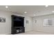 Finished basement with a entertainment center, neutral paint and carpet, and recessed lighting at 6618 Lynch Ln, Castle Rock, CO 80108