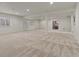 Expansive basement offers an open layout, natural lighting, and neutral carpeting ready for customization at 6618 Lynch Ln, Castle Rock, CO 80108