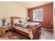 Cozy bedroom featuring wood floors and inviting decor at 6618 Lynch Ln, Castle Rock, CO 80108
