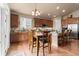 Spacious kitchen with wooden cabinets, granite countertops, and stainless steel appliances at 6618 Lynch Ln, Castle Rock, CO 80108