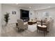 Elegant living room with plush seating, large TV, and stylish decor for comfortable entertaining at 6618 Lynch Ln, Castle Rock, CO 80108