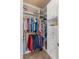 Organized walk-in closet with custom shelving, hanging rods, and drawers, providing ample space for clothing and accessories at 6618 Lynch Ln, Castle Rock, CO 80108